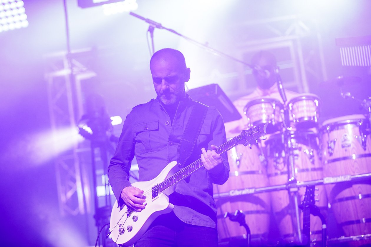 Jamiroquai – Rob on guitar.